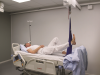 man using hoist for leg